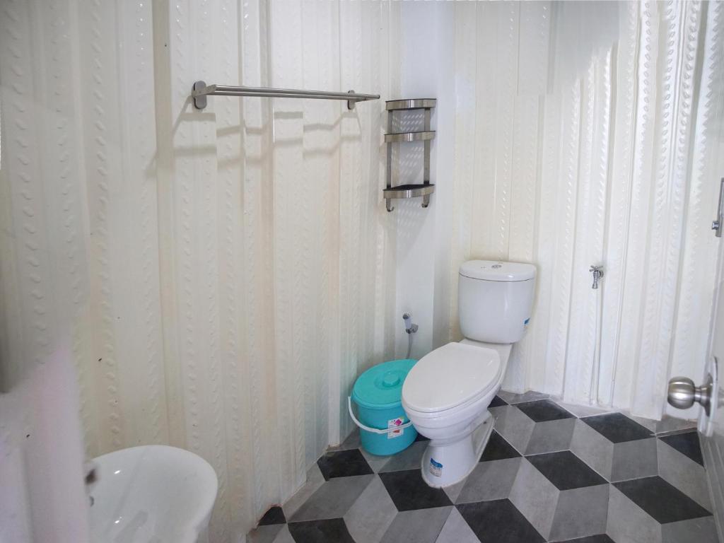 Koupelna v ubytování GSV Cottage Sharia