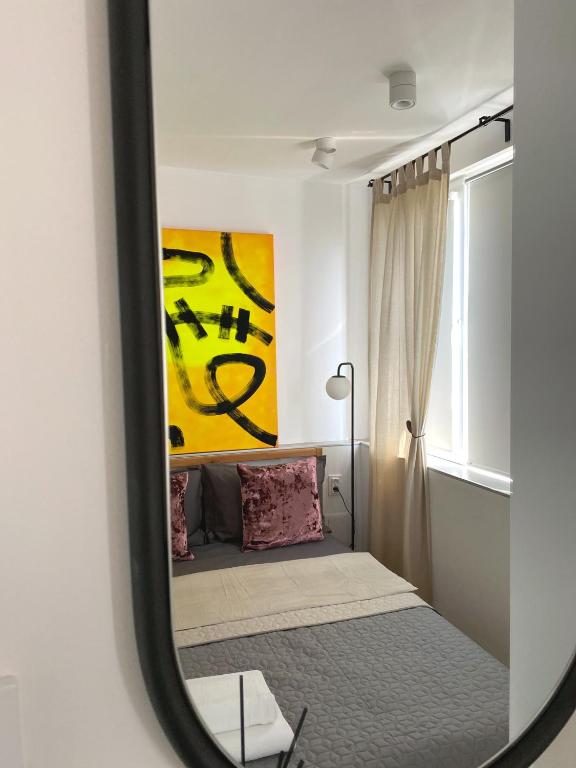 A bed or beds in a room at Snow Sheep apART - апартамент с две спални