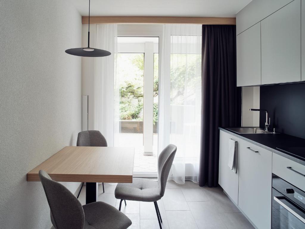 Kuchyň nebo kuchyňský kout v ubytování Hotel Neu-Schönstatt