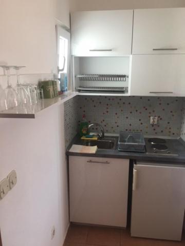 Kuchyňa alebo kuchynka v ubytovaní Apartmani Glavina