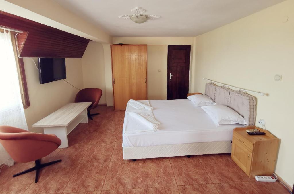 Postel nebo postele na pokoji v ubytování Hotel VALDI