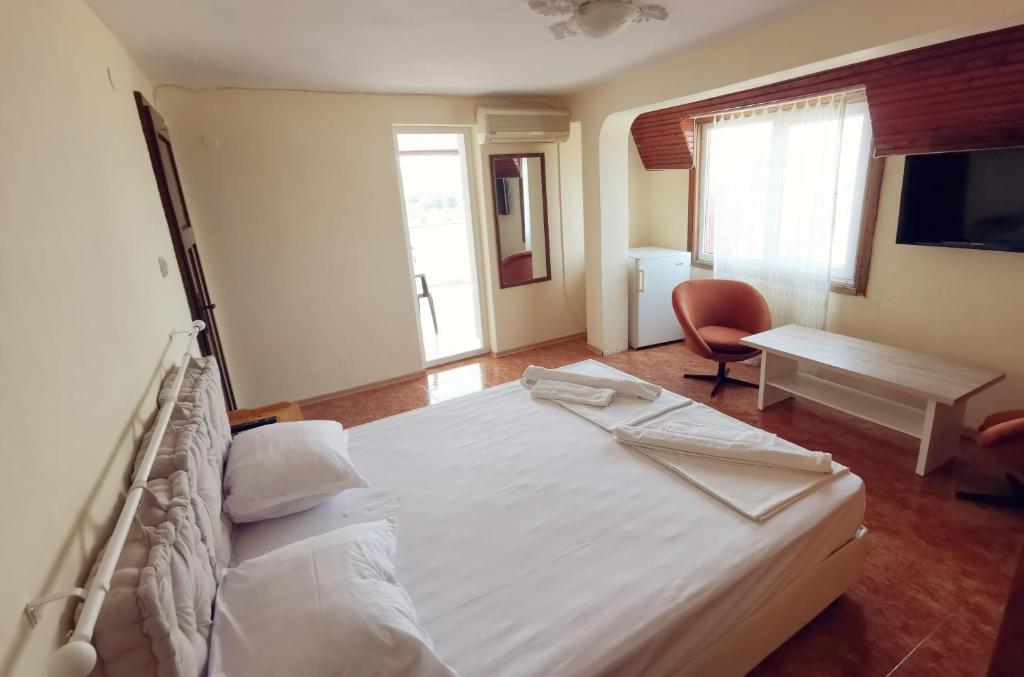 Postel nebo postele na pokoji v ubytování Hotel VALDI