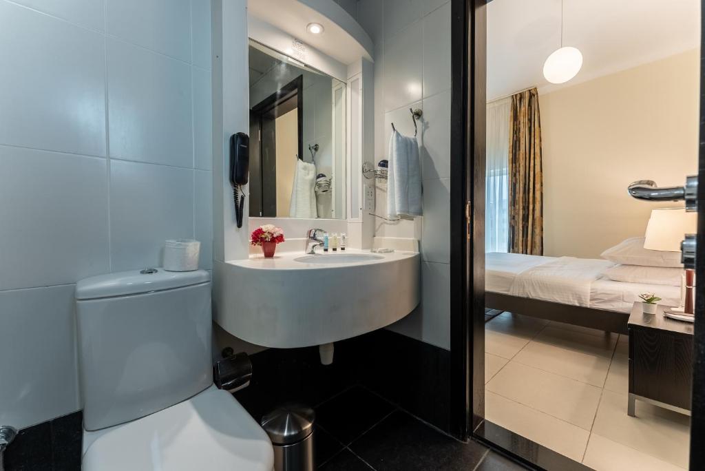 Et badeværelse på Gulf Oasis Hotel Apartments Fz LLC
