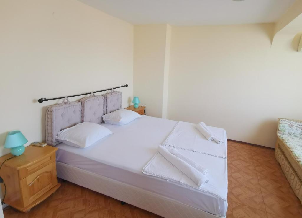 Postel nebo postele na pokoji v ubytování Hotel VALDI