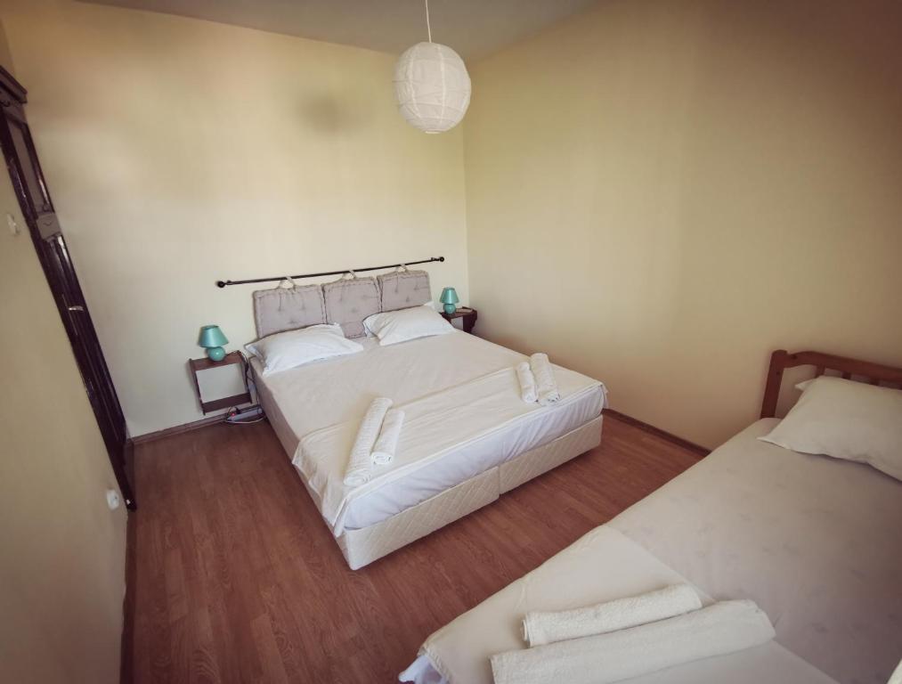 Postel nebo postele na pokoji v ubytování Hotel VALDI