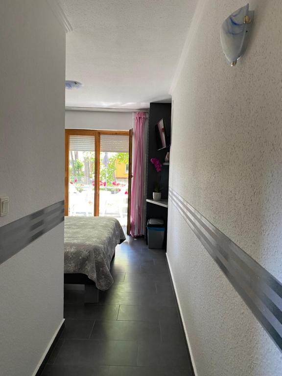 Postel nebo postele na pokoji v ubytování Pearl Home Siofok
