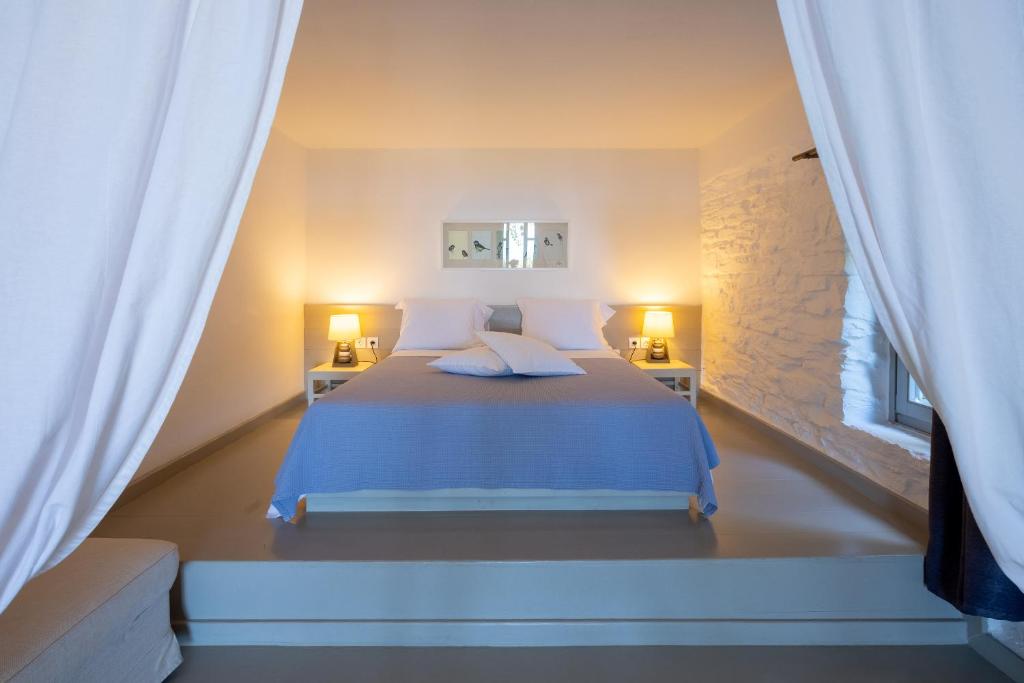 Postel nebo postele na pokoji v ubytování Kea Village Suites & Villas
