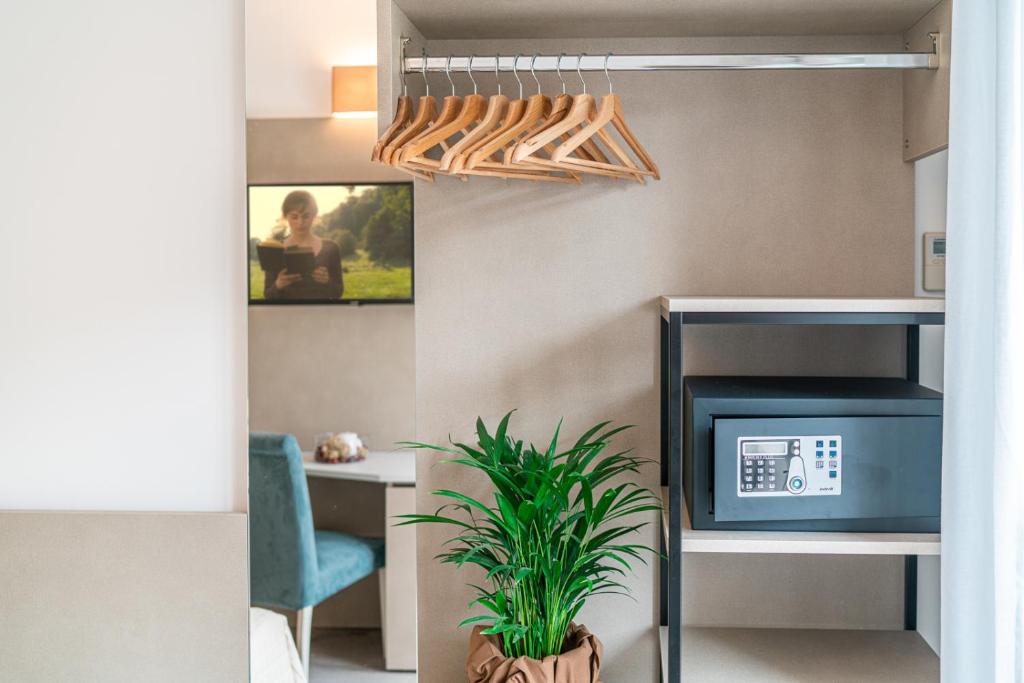 Kuchyň nebo kuchyňský kout v ubytování Hotel Pigalle