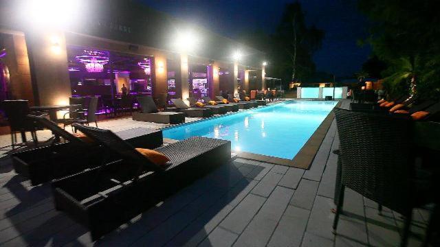 The swimming pool at or close to Player's Pool&Rooms