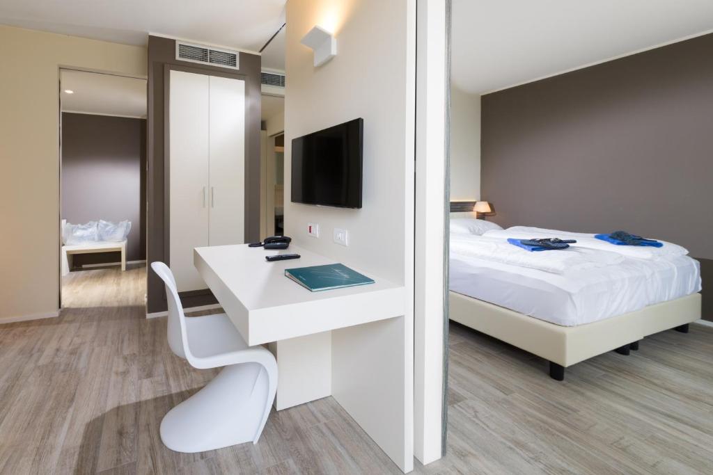 TV a/nebo společenská místnost v ubytování Hotel Maximilian