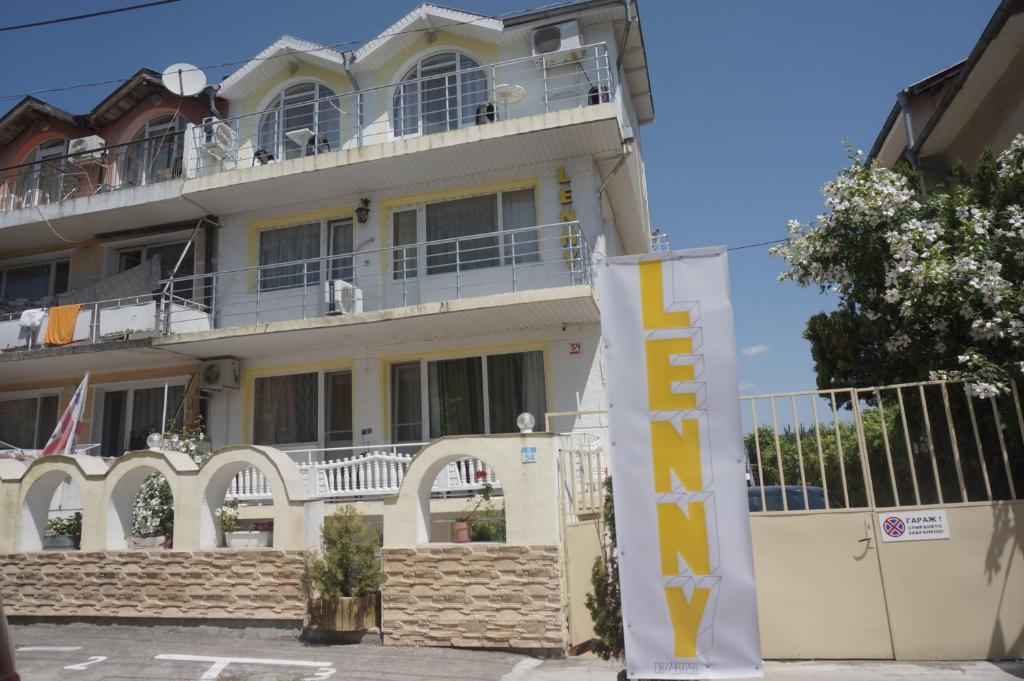 a building with a sign in front of it at Lenny in Kranevo