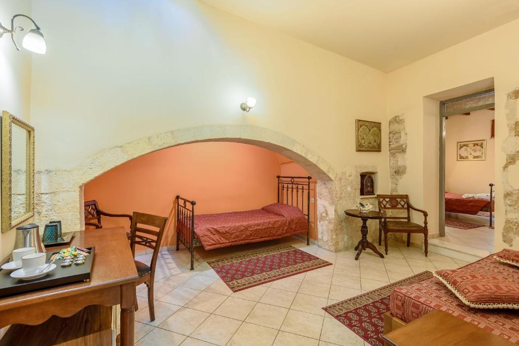 Postel nebo postele na pokoji v ubytování Belmondo Hotel