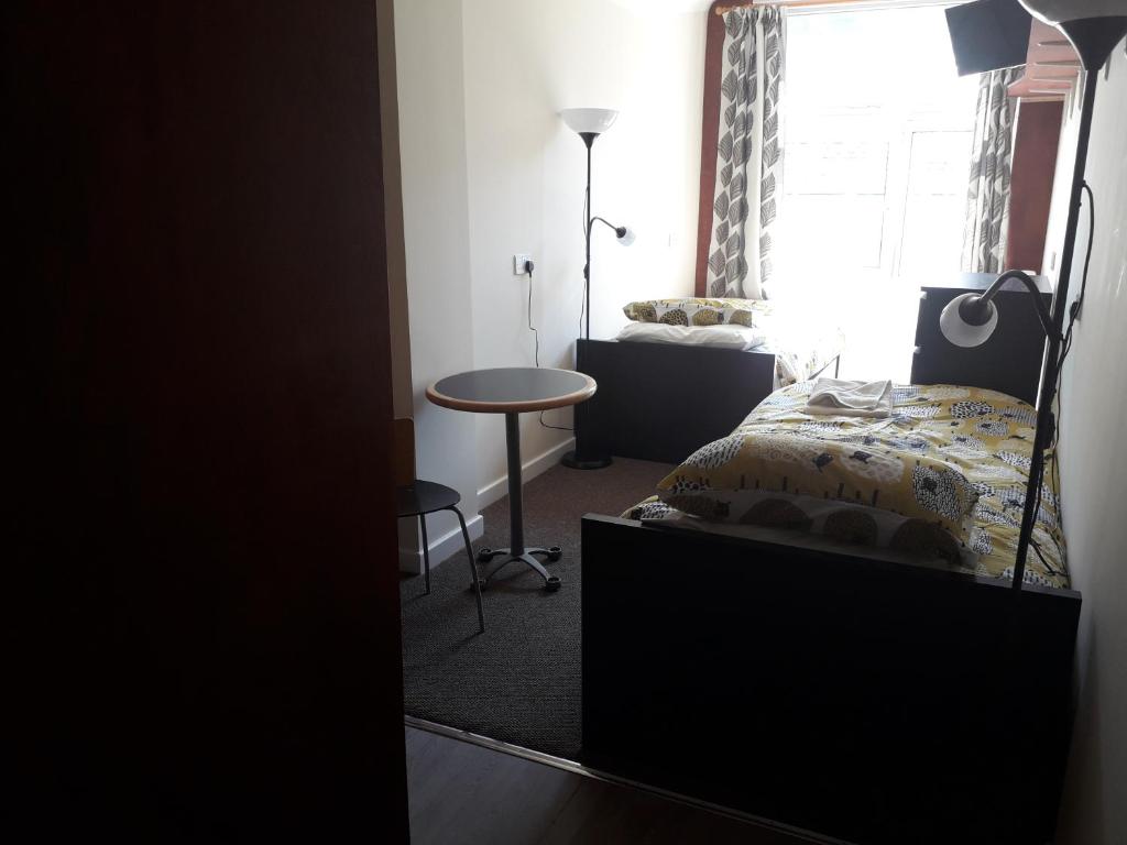 Postel nebo postele na pokoji v ubytování Ossians