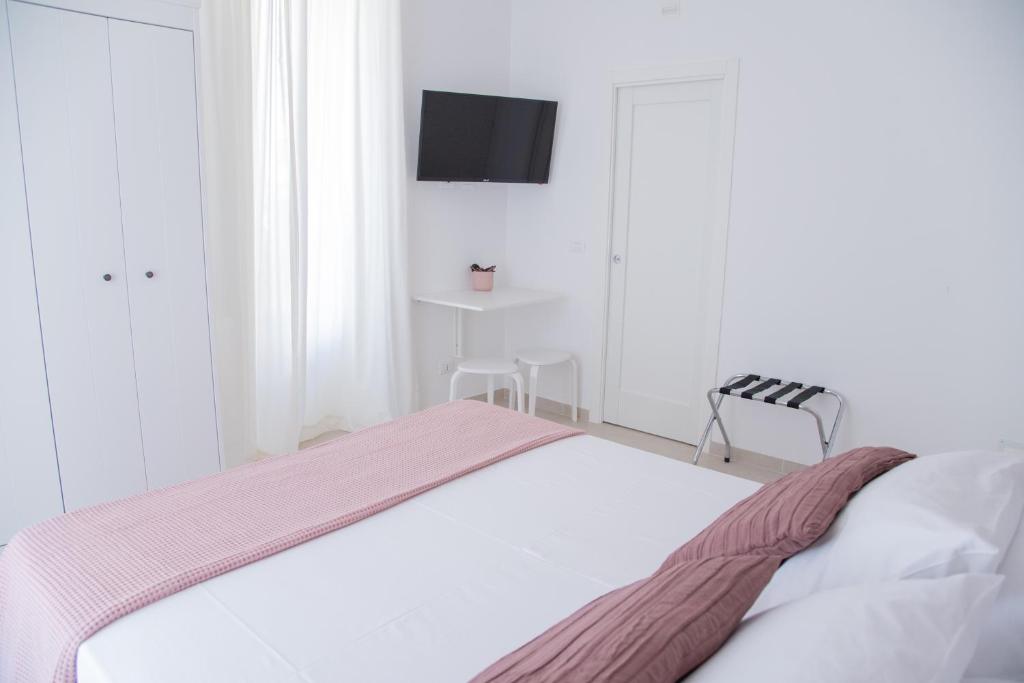 Postel nebo postele na pokoji v ubytování Casa Thuja
