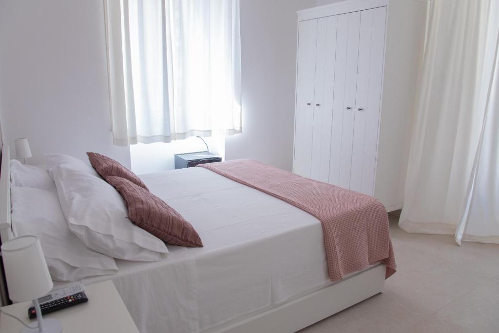 Postel nebo postele na pokoji v ubytování Casa Thuja