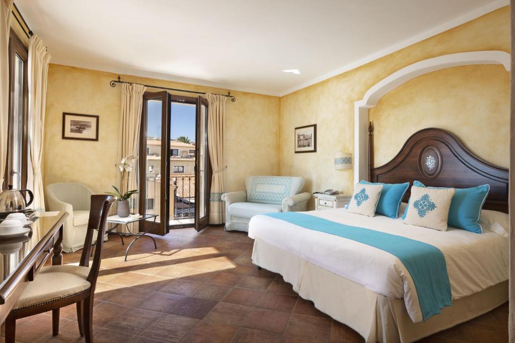 Postel nebo postele na pokoji v ubytování La Vecchia Fonte Boutique Hotel