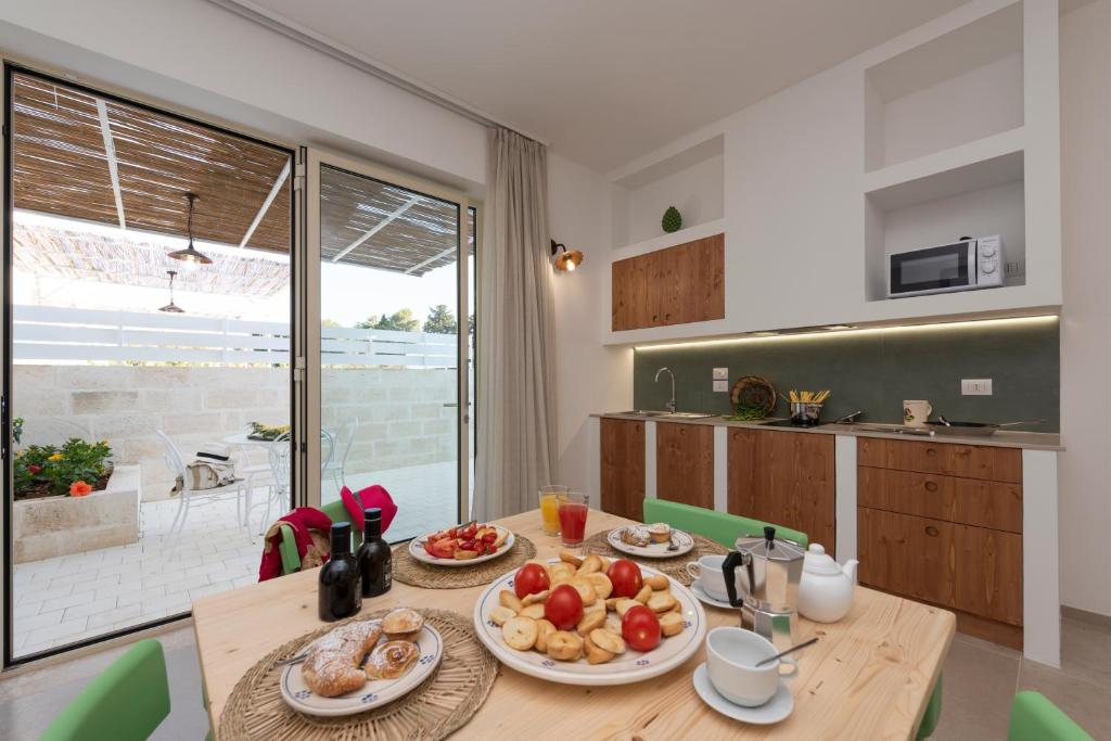 Kuchyň nebo kuchyňský kout v ubytování Livantea Agriresort e Residence
