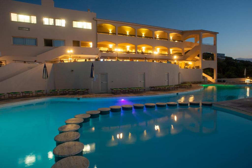 The swimming pool at or close to Castelsardo Resort Village