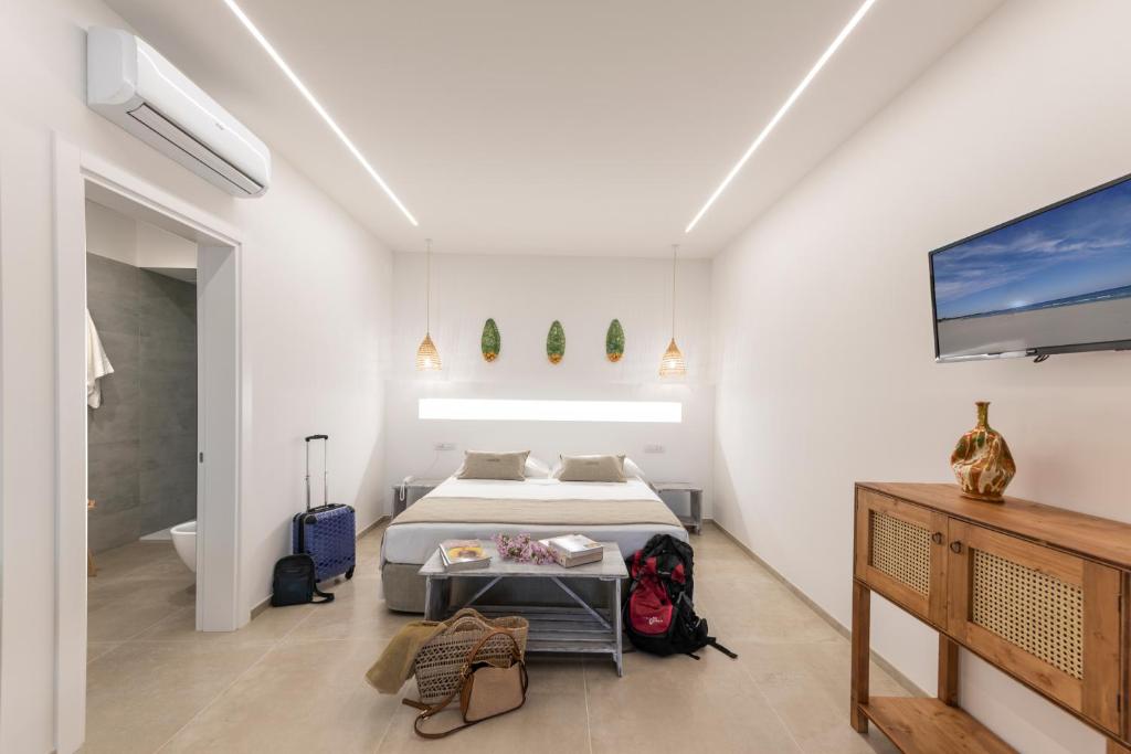 Postel nebo postele na pokoji v ubytování Livantea Agriresort e Residence