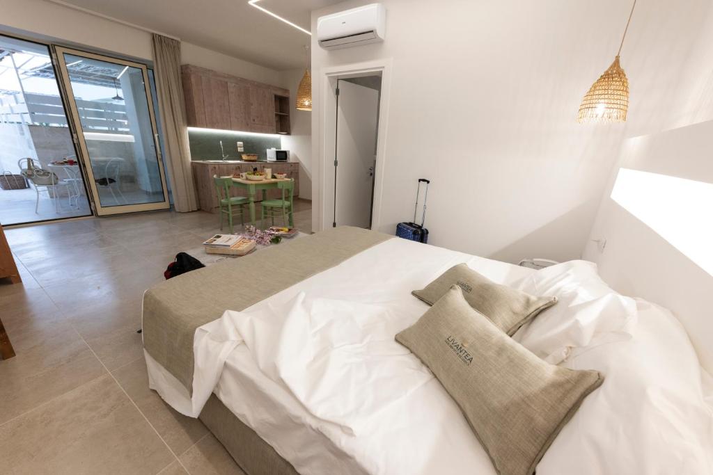 Postel nebo postele na pokoji v ubytování Livantea Agriresort e Residence