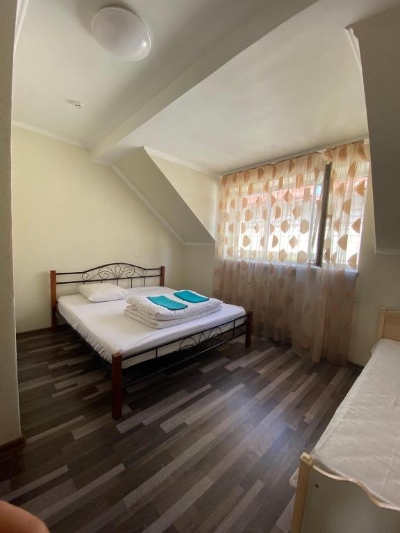 Postel nebo postele na pokoji v ubytování VIP hostel