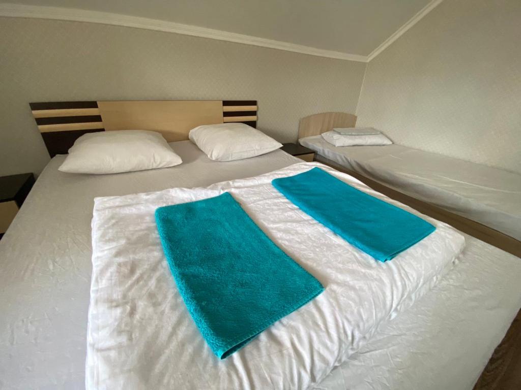 Postel nebo postele na pokoji v ubytování VIP hostel