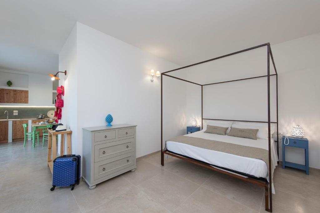 Postel nebo postele na pokoji v ubytování Livantea Agriresort e Residence