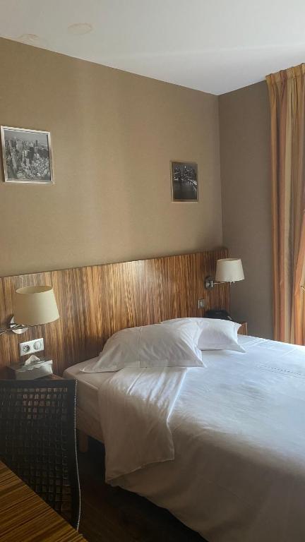 Postel nebo postele na pokoji v ubytování Blanche de Castille