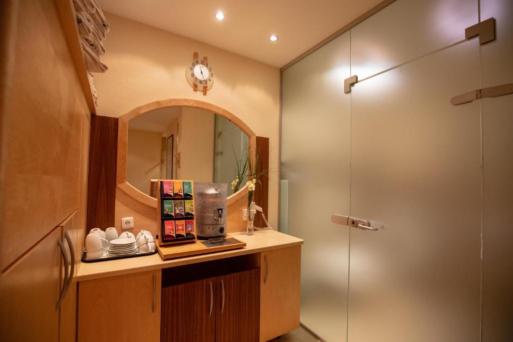 Kuchyň nebo kuchyňský kout v ubytování Hotel Charly