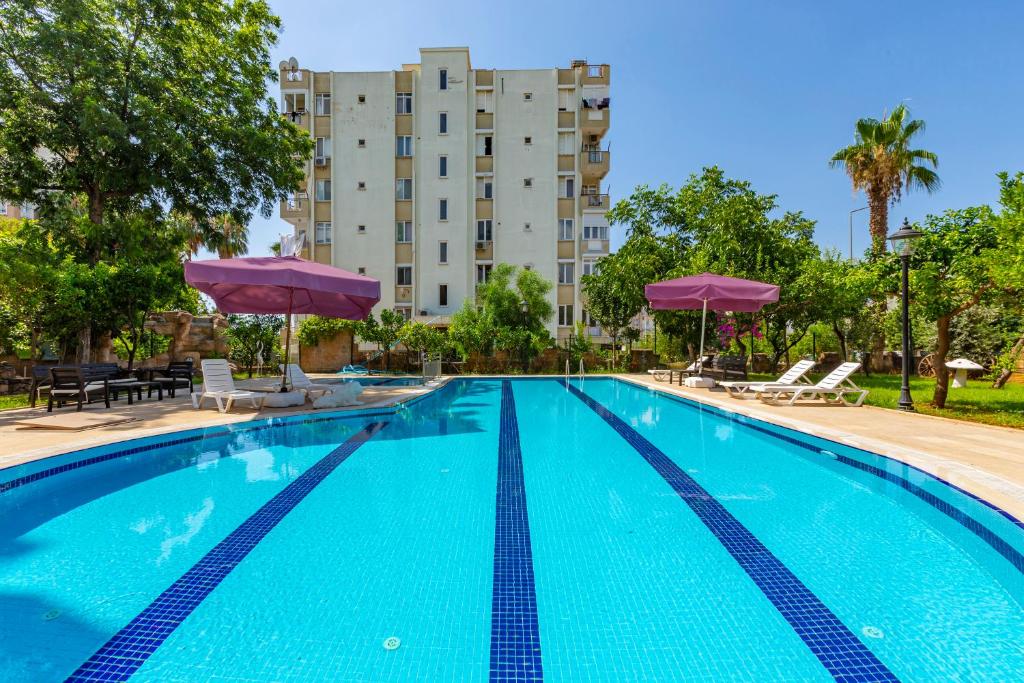 The swimming pool at or close to Melissas Suites Lara