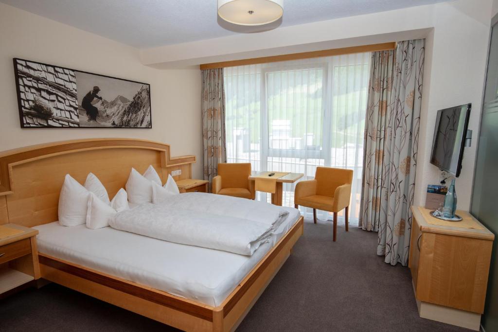 TV a/nebo společenská místnost v ubytování Hotel Charly