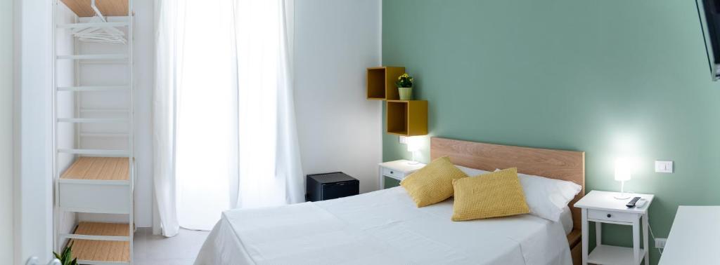 Postel nebo postele na pokoji v ubytování Casa Thuja