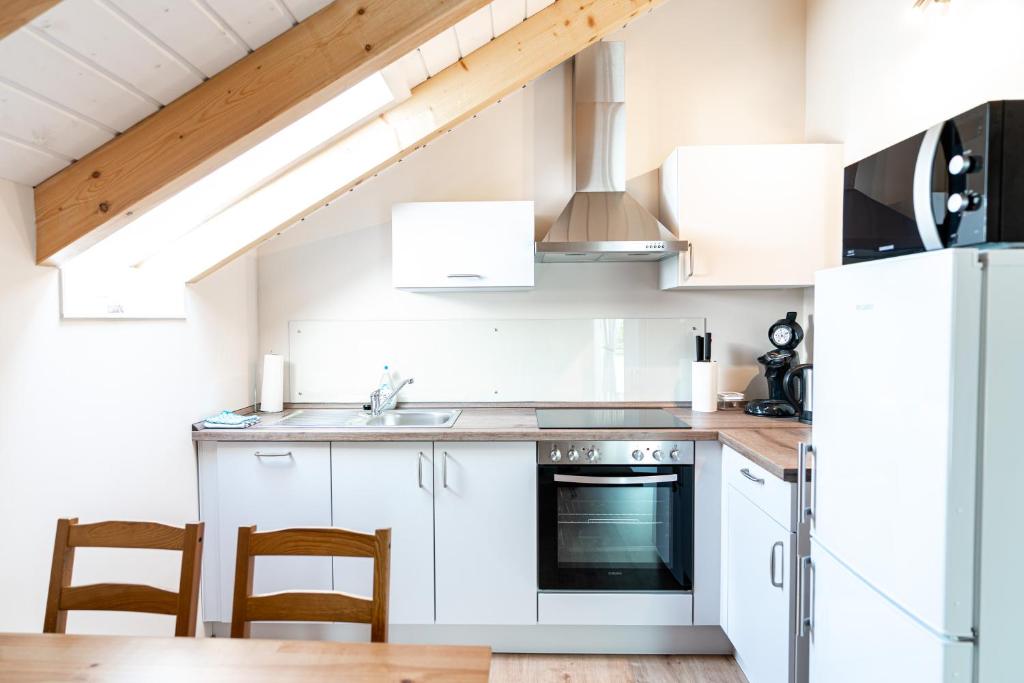 Kuchyň nebo kuchyňský kout v ubytování Ferienwohnung Bad Camberg - Apartment Weisse Graeben