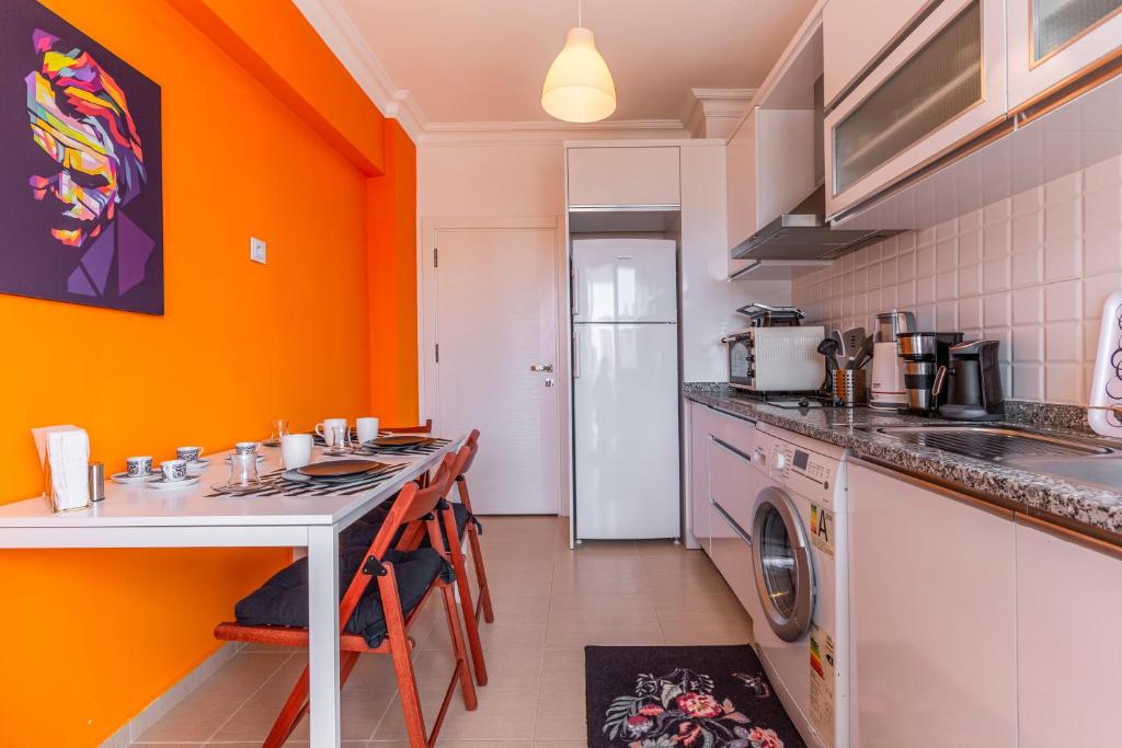 A kitchen or kitchenette at Melissas Suites Lara