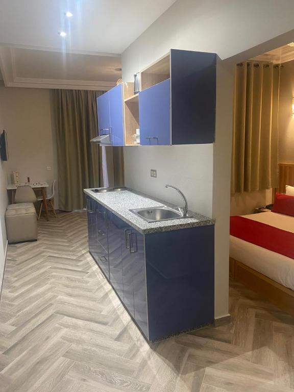 Postel nebo postele na pokoji v ubytování Golden Beach Appart'hotel
