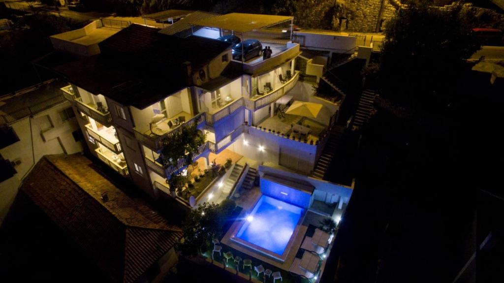 an overhead view of a large house at night at Apartments Mar in Ulcinj