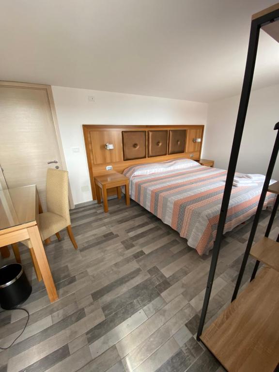 Posteľ alebo postele v izbe v ubytovaní B&B Torre Pozzillo