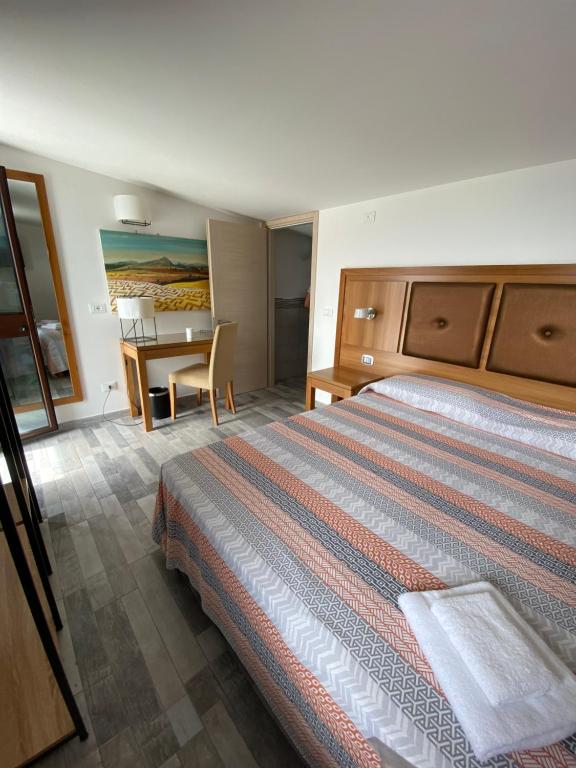 Posteľ alebo postele v izbe v ubytovaní B&B Torre Pozzillo