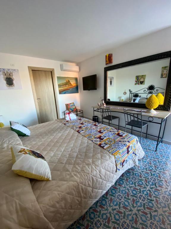 Posteľ alebo postele v izbe v ubytovaní B&B Torre Pozzillo