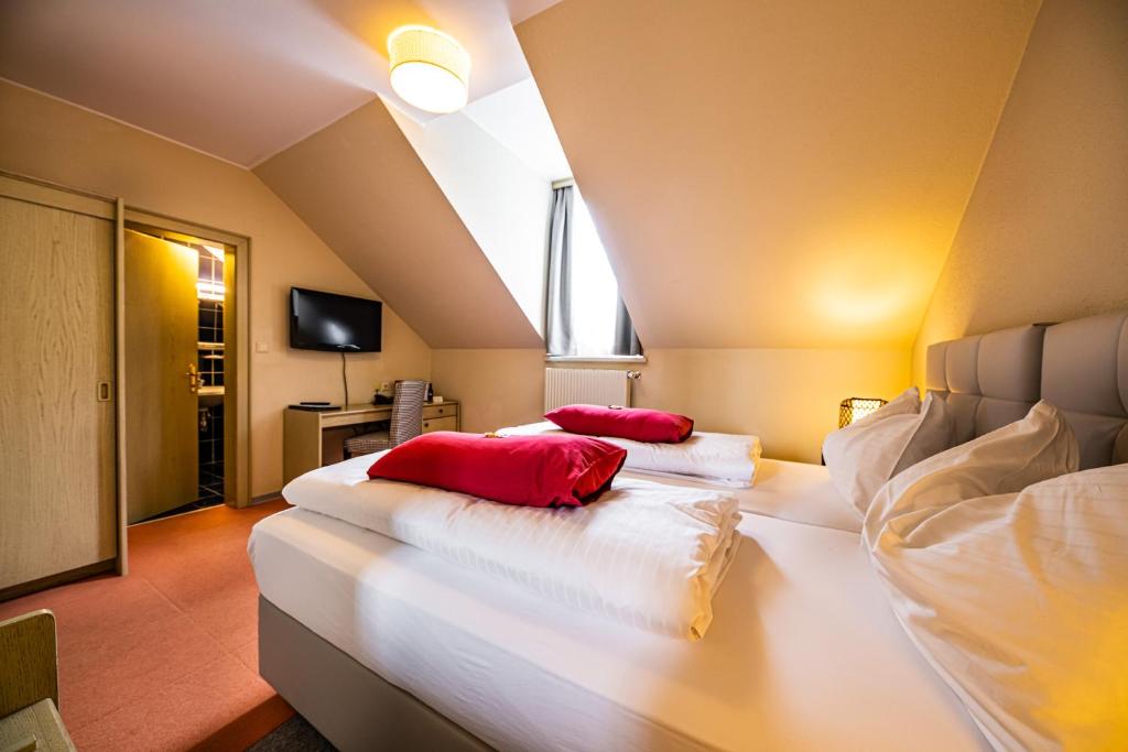 Posteľ alebo postele v izbe v ubytovaní Motel Zeltweg - Self-Check-in