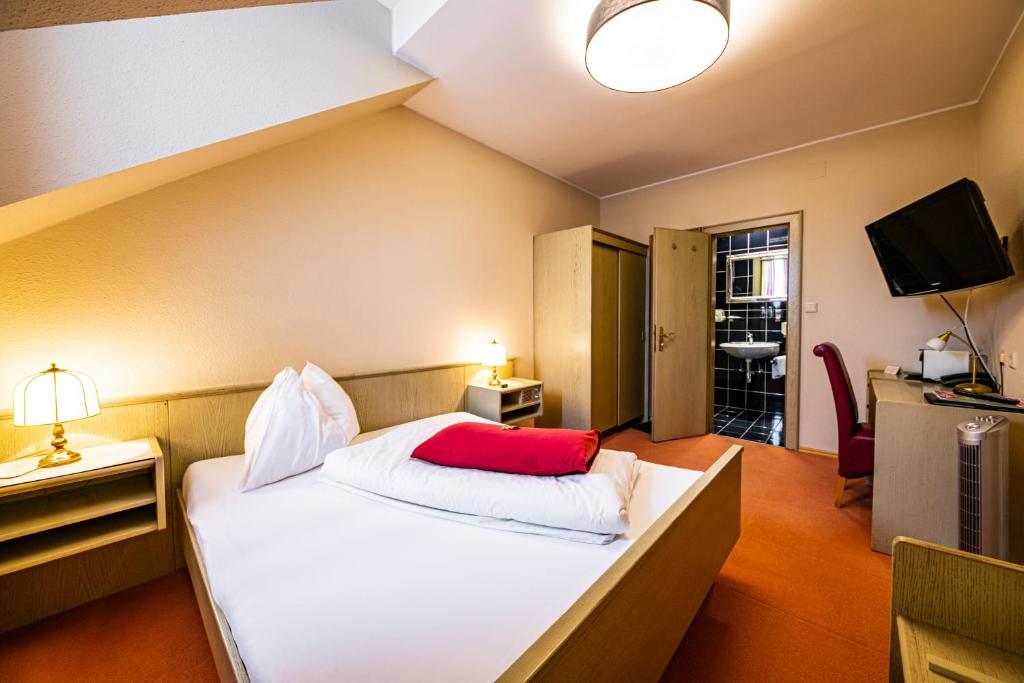 Posteľ alebo postele v izbe v ubytovaní Motel Zeltweg - Self-Check-in