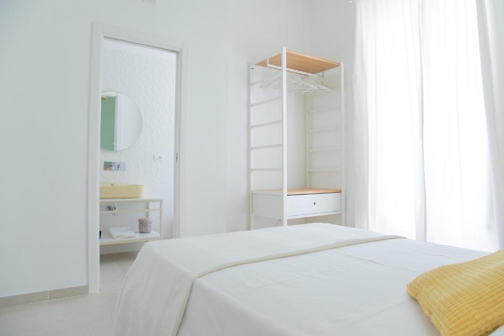 Postel nebo postele na pokoji v ubytování Casa Thuja