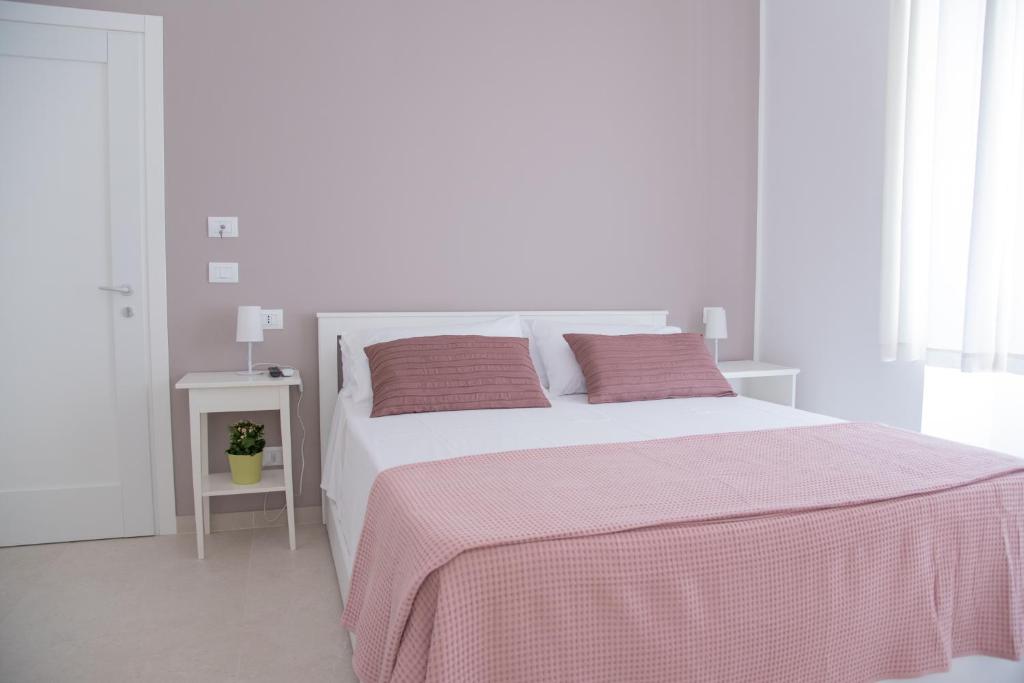 Postel nebo postele na pokoji v ubytování Casa Thuja
