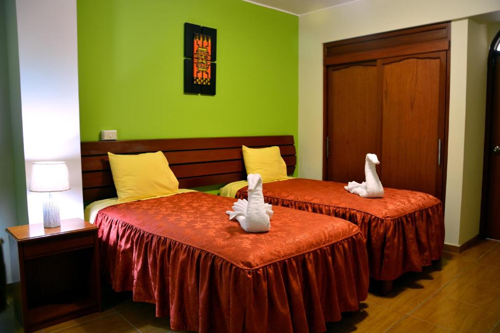 Postel nebo postele na pokoji v ubytování Hotel Sol del Sur