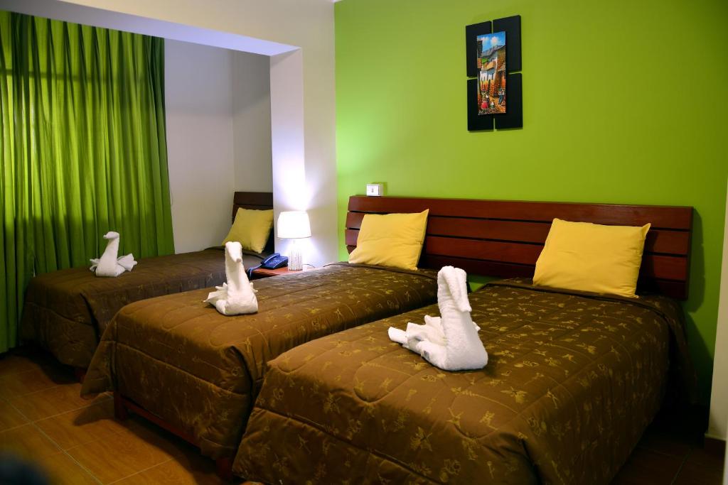 Postel nebo postele na pokoji v ubytování Hotel Sol del Sur