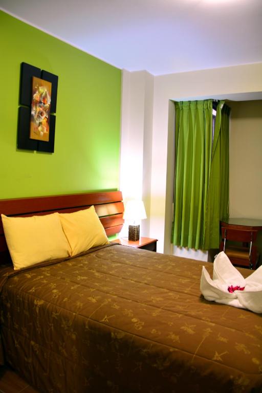 Postel nebo postele na pokoji v ubytování Hotel Sol del Sur
