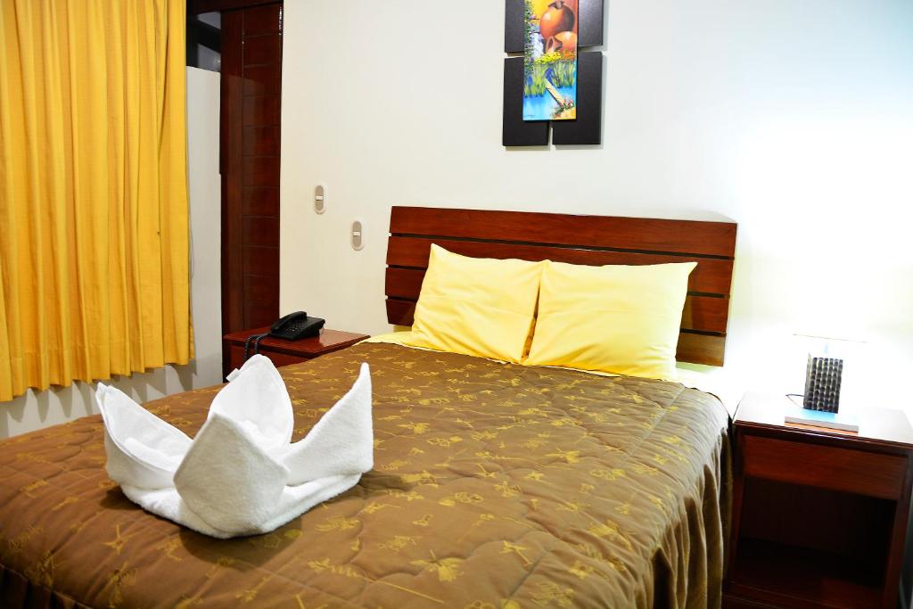 Postel nebo postele na pokoji v ubytování Hotel Sol del Sur