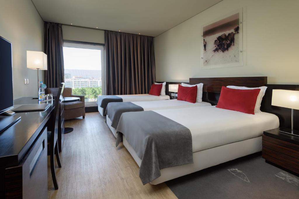 Postel nebo postele na pokoji v ubytování Melia Ria Hotel & Spa
