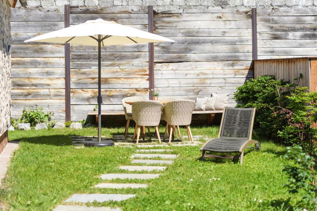 Vonkajšia záhrada v ubytovaní ArlBerglife Ferienresort