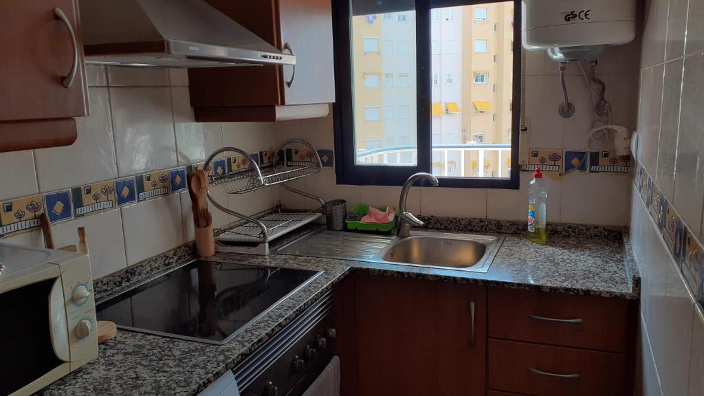 Kuchyň nebo kuchyňský kout v ubytování Apto Mar del Este alquiler semanal solo familias